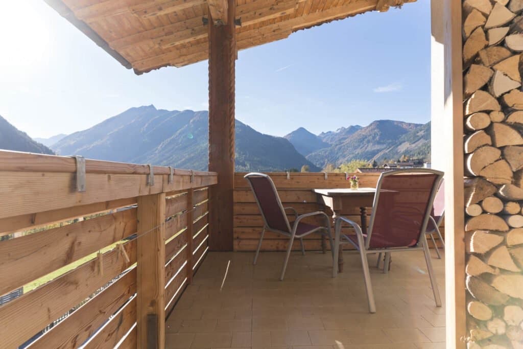 A timber balcony looking out to the mountains