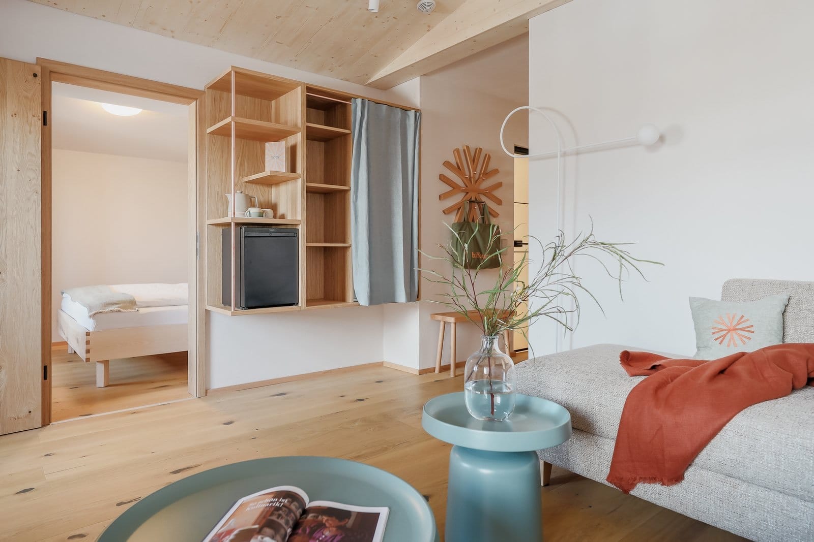 Bright hotel room with timber furniture